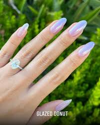 Chrome nails 2025 trending designs including chocolate glazed donut and strawberry chrome nails