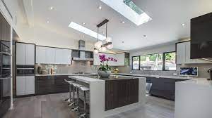 Kitchen Island With Waterfall Edge And 2 Different Countertop Materials Kitchen Design Kitchen House Raffle