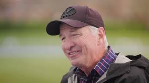 Kenneth Rooks receives congratulations from President Holland