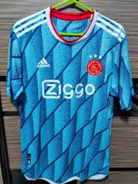 The kit is a tribute to the ajax fans and the love shared by the club and its fans for reggae legend bob marley and his iconic song, three little birds. Ajax 20 21 Away Kit Men S Fashion Activewear On Carousell