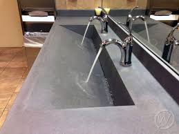 commercial restroom concrete ramp sink