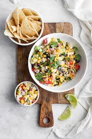 Black Bean Corn Avocado Salsa Mexican Dip Is The Perfect Game Day Appetizer This Mexican Dip Recipe Is Filled With Black Beans Corn Feta Avocado Salsa And So Much M Mexican Food Recipes
