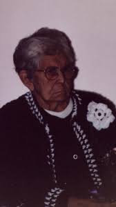 Jane Bell with her nieces Florence, Sandy, Jeannette, Rose, Evelyn and Sue  all holding new dolls. Date: 1968 Location: Old Massett, Haida Gwaii,  British Columbia, Canada