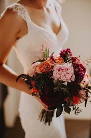 Get bridal bouquet flower at target™ today. Rich And Moody Bouquet Bride Wedding Burgandy Pink Orange Peach Peonies Roses Carnation Peach Wedding Bouquet Orange Wedding Flowers Orange And Pink Wedding