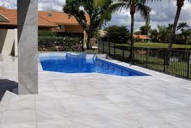 Form meets function with this porcelain pool deck designed and installed by eagle pools of jacksonville, florida. 2cm Patio Porcelain Pavers Tampa Orlando Kissimmee Crystal River Fl