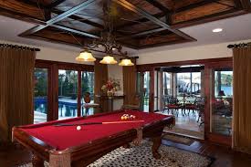 Sophisticated Tuscan Game Room Boasts Red Felt Pool Table Game Room Pool Table Red Felt