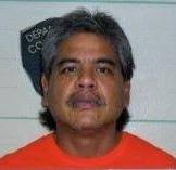 Man arrested in connection to threats of shooting up house