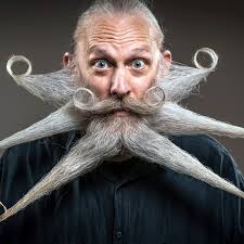 Beards, prayers and steam rollers: Sunday's top images