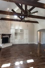 Gorgeous Hand Scraped Red Oak Floor 42 Wood Burning Fireplace With Floor To Ceiling Stone Surr Corner Fireplace Living Room Corner Fireplace Fireplace Design