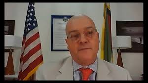 DCM Mark Cullinane gives remarks at the closing ceremony for the USAID  Climate Change Adaptation Program