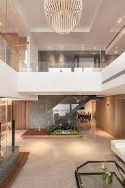 Stairs Hangs From Upper Floor Undisturbed Ground Floor Space Modern House Design Luxury House Plans Modern Houses Interior