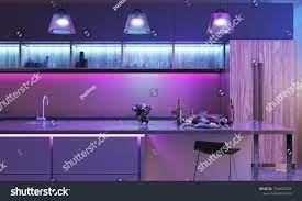 Curious to know which light source works better for kitchen vs. Modern Kitchen With Colored Led Lights Light Strip In Blue Color And Three Lamps In Purple Color Sma Colored Led Lights Modern Kitchen Colours Strip Lighting