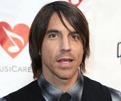 Anthony Kiedis leader singer of Red Hot Chili Peppers wearing Ken Carson's  "A Great Chaos" hoodie