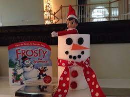 Elf On The Shelf Elfie Sits In The Toilet Paper Snowman And Brings A Frosty Book Frosty The Snowmen Elf On The Shelf Frosty
