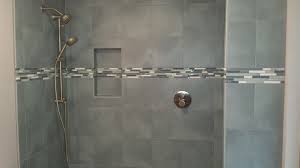Recessed Shower Niche With Tile Accent Liner Going Through It Shower Niche Shower Tile Tile Installation