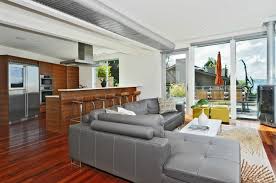 Depending on the undertone, a gray sofa can fit well with white, beige, black, sepia, and wood tones. Sectional Couches For Sale Family Room Traditional With Cage Pendants Ceiling Ceiling Lighting Coffered Ceiling Corner Sofa Dark Wood Kitchen Foxls Com