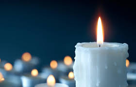 The burning candle in hands. White Candle Magic Spells Lovetoknow
