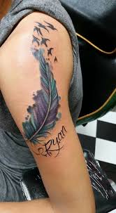 Feather Tattoo With Birds And Sons Name On Shoulder Blue Teal Purple And Pink Feather Tattoos Bird Shoulder Tattoos Feather Bird Tattoo Shoulder