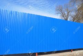 In this idea, the metal sheet is finished in black which works as the panel while the frame and the pots in beige complement it. Blue Metal Fence Garden Fencing Fence Panels Garden Gates Stock Photo Picture And Royalty Free Image Image 87169641