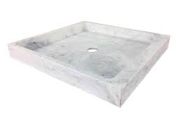 I purchased on and it called for a 1/2 inch mortar bed underneath the tray to compensate for any possible unlevel surface. Southern Concrete Creations 36 W X 36 D Shower Base Wayfair