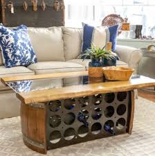 Wine coffee table should always look refreshing, unique and elegant, as that is where you would sit for a fresh cup of coffee and feel rejuvenated. Wine Barrel Bottle Storage Coffee Table Wine Country Accents