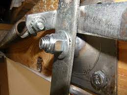 A Lock Nut Holds The Support Arm Snuggly On The New Axle Door Handles Attic Stairs Decor