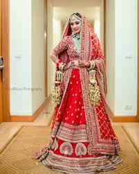The Real Anushka Sharma Deepika Padukone Lehenga Cost Frugal2fab Bridal Lehenga Red Indian Bridal Lehenga Bridal Lehenga Prakash padukone can be seen walking with family members in the picture below. deepika padukone lehenga cost