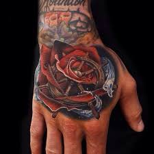 So long it keeps up with the desired theme or. 10 Beautiful Rose Hand Tattoos Tattoodo