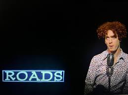 Maybe you guys will appreciate this. The Wig Master was in “So I Married An Axe  Murderer” with Michael Richards. Right behind Mike Myers head in the next  scene is the word “