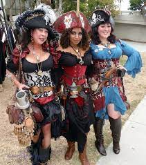 These Ladies Look Great I Think The Corsets Are From Damsel In This Dress Female Pirate Costume Pirate Wench Costume Pirate Costume