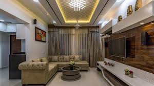 This 2bhk home's interior design includes a sleek tv unit with wooden panel work and handless drawers. 2 Bhk Flat Interior Designing For Mr Devidas Kshirsagar At Ravet Pune Kams Designer Zone Youtube