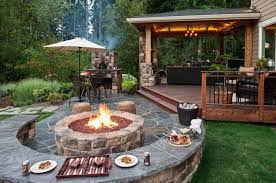 A large chicago area backyard was redesigned by james martin and associates to include a traditional patio with pavers, broad lawn, and stepping stones that lead to an arbor and pergola with another outdoor seating area. 30 Incredibly Inspiring Contemporary Deck Ideas With Fire Features Backyard Patio Backyard Patio Designs Patio Design