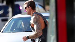 The evidence was later edited out (right) in the official photo released. Ben Roberts Smith S Famous Fitness Routine Continues Through Sydney S Streets Daily Telegraph