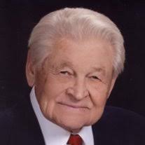Obituary of Raymond Kostrzewa