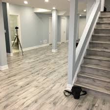 Elite waterproof laminate flooring with scratch protection is ideal for any level or room in the home, both the floor and accent wall. 75 Beautiful Laminate Floor Basement With Blue Walls Pictures Ideas July 2021 Houzz