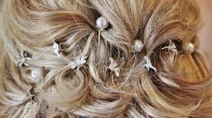 When going for a sleek wedding hairstyles for long hair, make sure to add some shine to your hair to help it look polished. Wedding Hairstyles Elegant Bridal Updos