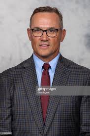 Steve Yzerman of the Detroit Red Wings poses for his official...