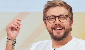 Iain stirling reads off his iphone into a huge microphone. Iain Stirling Net Worth And Personal Life Ian Stirling
