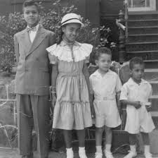 Kenneth Miller (left) and his siblings in front of their house at 1204 T  Street NW