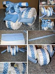 Baby Diaper Tricycle Giving Useful Gifts To New Parents At A Baby Shower Is Always A Great Idea Tricycle Diaper Cakes Diaper Tricycle Baby Shower Diaper Cake