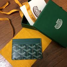 Go minimalist with a card holder. Saint Sulpice Cloth Card Wallet Goyard Green In Cloth 15113050
