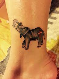 Elephant Tattoo With Cross 3 Elephant Tattoo Elephant Tattoo Design Tattoos