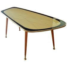 A dark teakwood coffee table with upper raised lip to the edge of the table top and small wood side stretches joining the conical legs. Midcentury Side Coffee Table Germany 1950s For Sale At 1stdibs