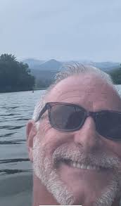 The mountain range behind me is called “Bear Meat”, it's part of the  extended smoky mountain range. It's pretty spectacular sunrise. Of course  these photos don't do it justice.