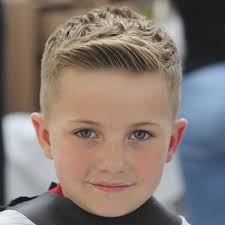 A great way to tame an afro, remove the hair from the face, while also finding a perfect curly hairstyle for boys is creating this high top long afro ponytail. Cool 7 8 9 10 11 And 12 Year Old Boy Haircuts 2021 Styles
