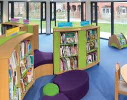 Mobile Children S Library Shelving Shown With Soft Hub Seat Library Shelves Mobile Library Library Furniture