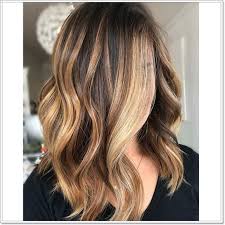 Bright red shades can look really magical on dark brown hair, and a touch of golden can make for a radiant hairstyle statement. 108 Caramel Highlights That Ll Blow Your Mind 2020