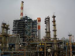 The crude petroleum is heated and the hot gases are passed into the bottom of a distillation column. Oil Refinery Energy Education