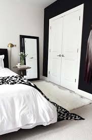 In this room, the patterned floor ties the white walls to the black one. From Lackluster To Lovely Joy S Bedroom Makeover Bedroom Makeover Remodel Bedroom Bedroom Design
