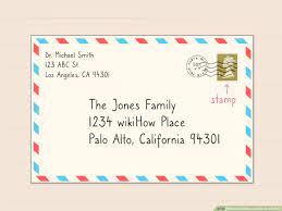 The recipient's family name and address goes in the center of the envelope. Simple Ways To Address A Letter To A Family 11 Steps